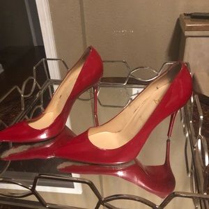 Red Christian Louboutin Stilettos.